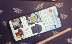 temu website on a smartphone, shopping t-shirts